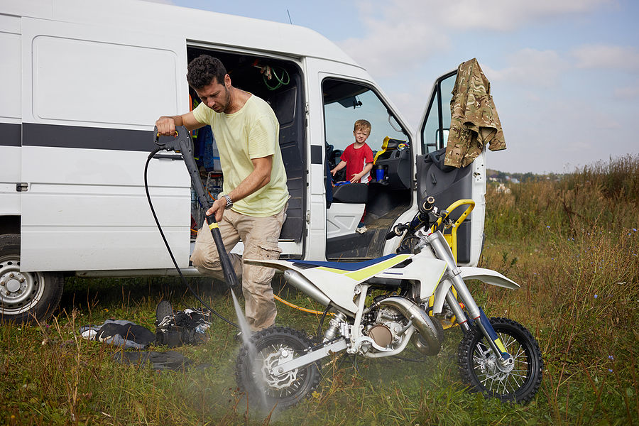 Two-wheeler cleaned down after a muddy ride